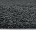 Charcoal Washable Rug in a solid dark grey colour, fully machine washable.