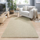 My Rug Stone Beige Washable Rug with a shaggy pile. styled in a living room.